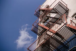 Tall staircase with railings of concrete building