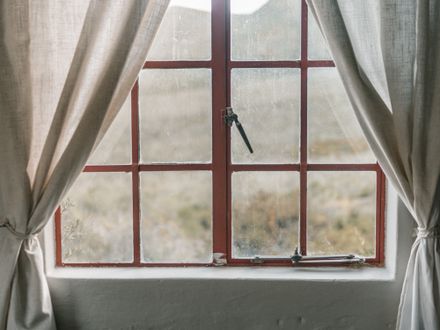 Fresh window blinds being installed on a window