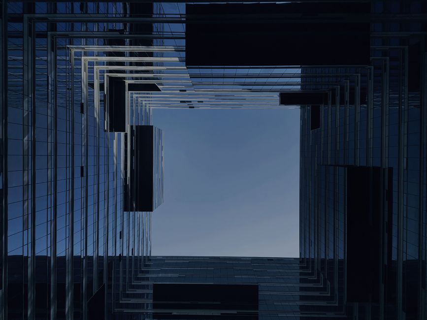 From below shot of square form of contemporary business center walls going up to sky