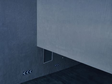 Gray wall of parking lot with pointers