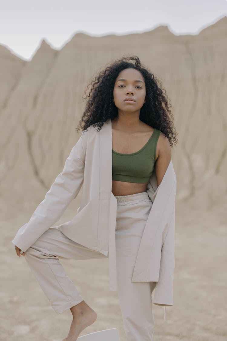 Girl In White Coat And Green Crop Top