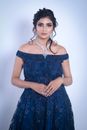 Woman in Blue Off Shoulder Evening Gown