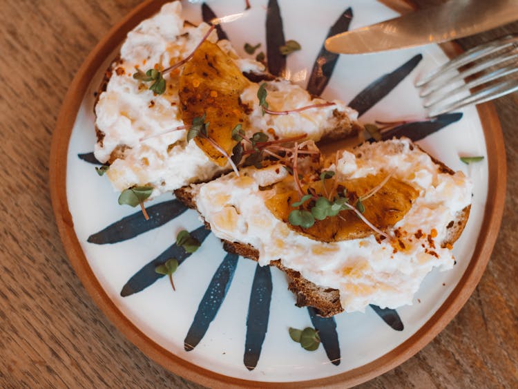 Slices Of Pie With Whipped Cream On Top