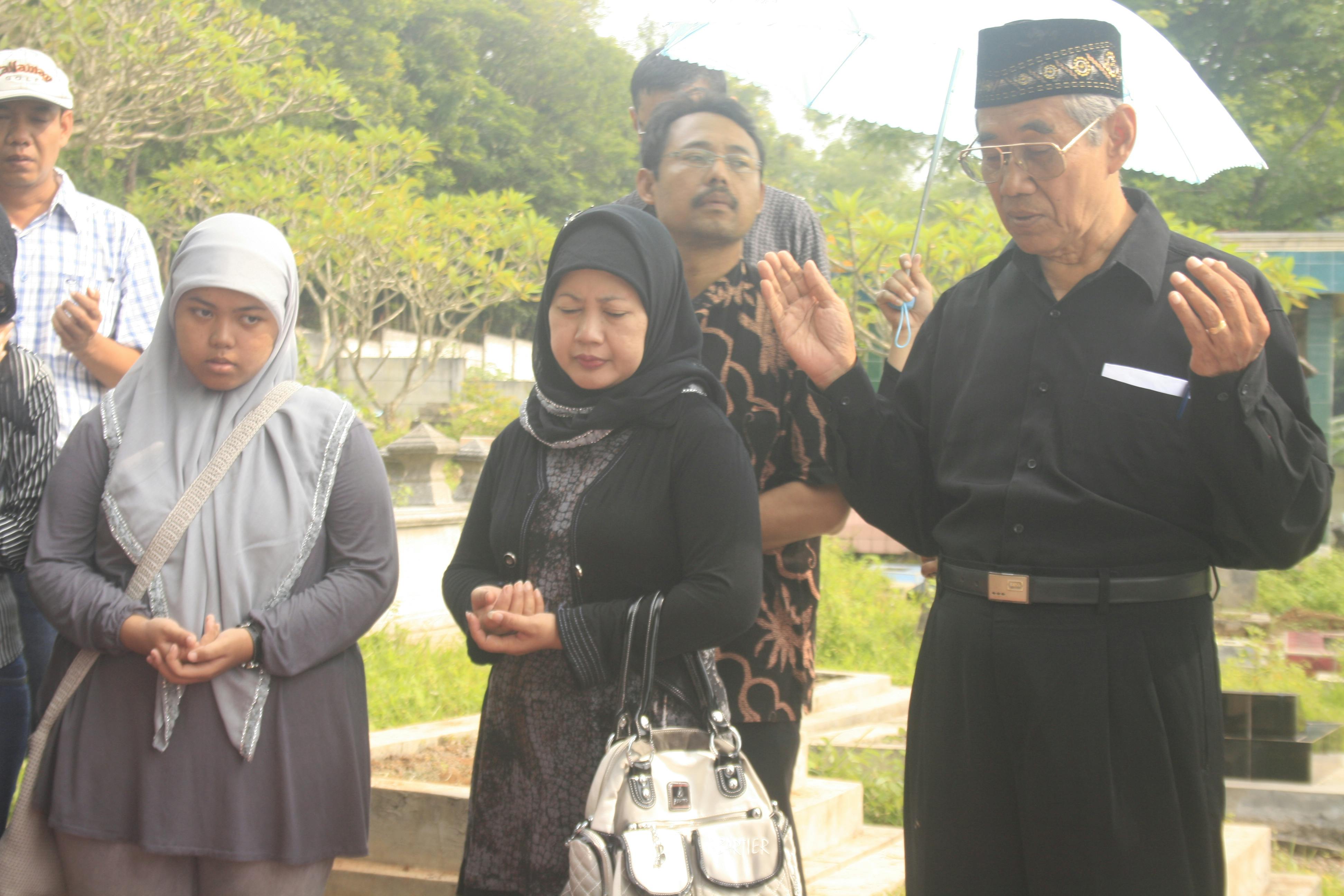 Close-up of a ladle serving hearty stew into a bowl