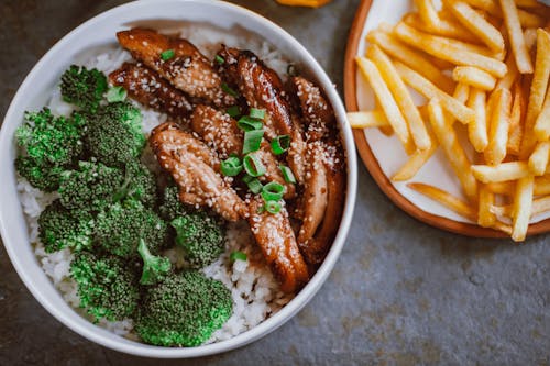 Rice Toppings and French Fries on the Table