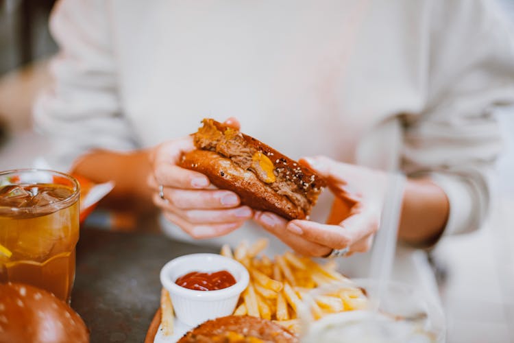 Hands Holding Sandwich