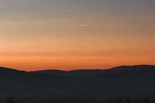 Free Beautiful sunset view with silhouettes of mountains in Liberec, Czechia. Stock Photo
