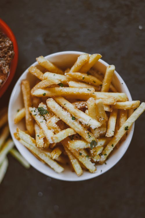 Free French Fries in a Ceramic Bowl Stock Photo