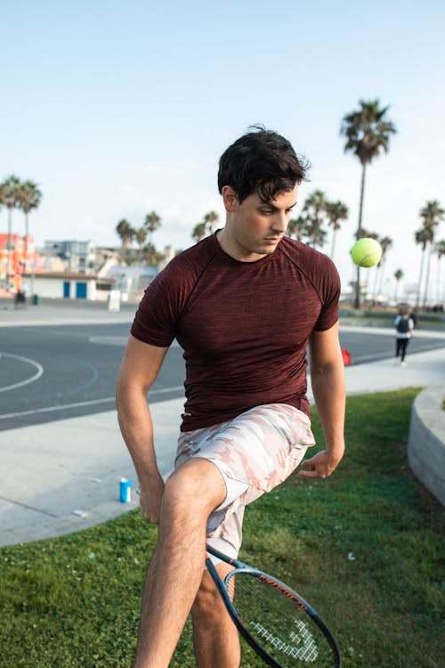 A Man Playing Tennis