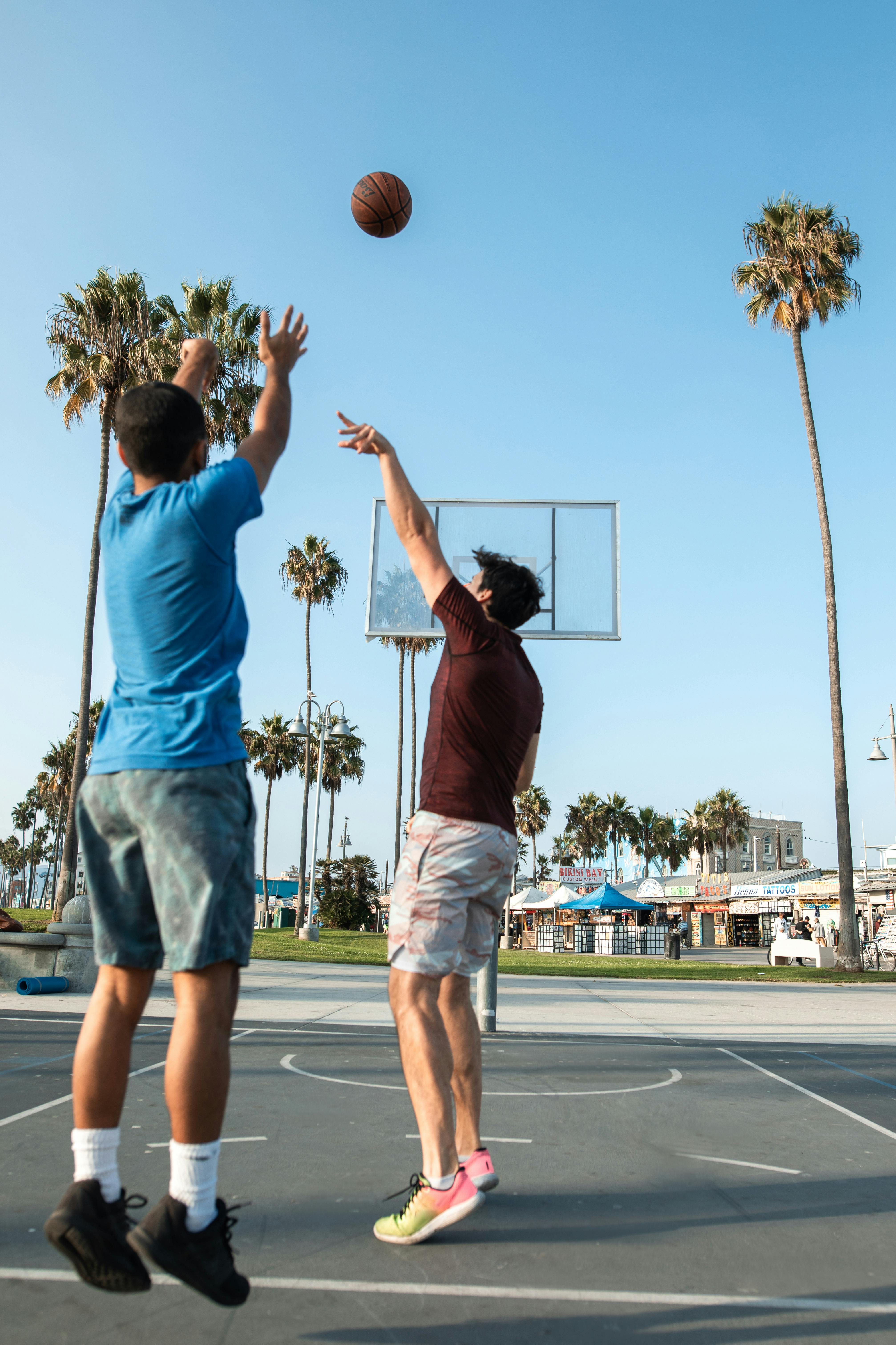 men playing basketball