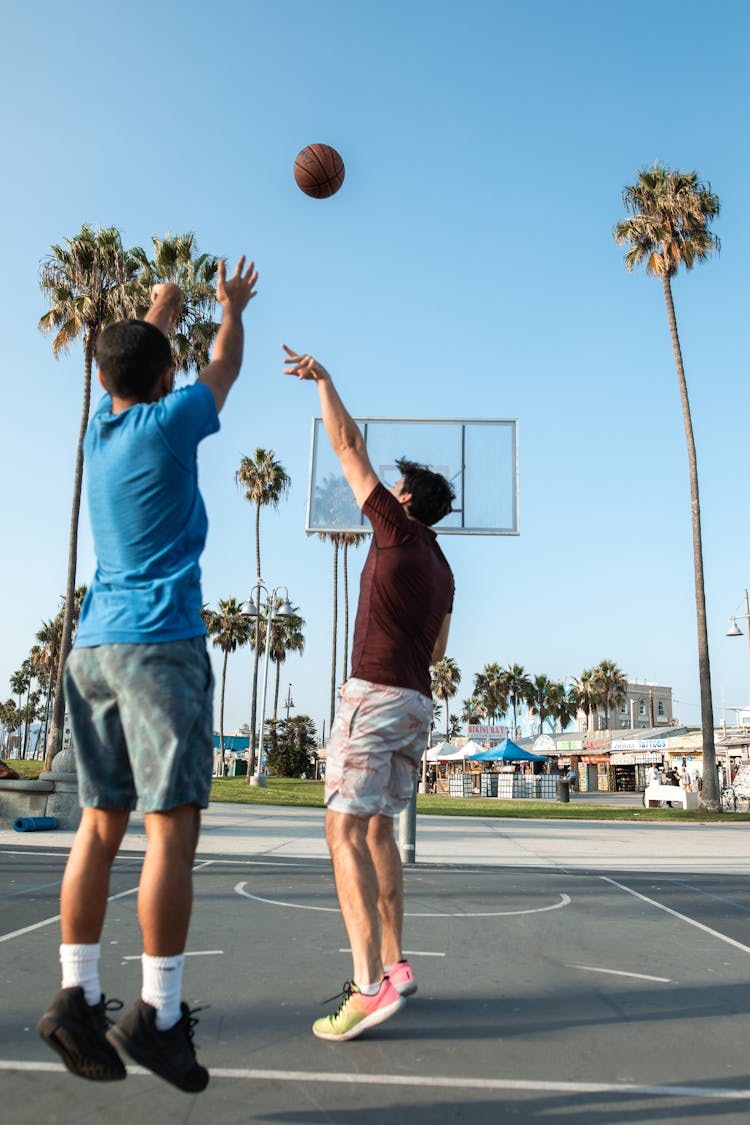 Men Playing Basketball