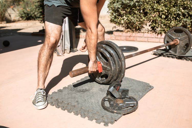 Man Preparing A Heavy Barbell