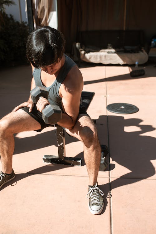 Man Lifting a Dumbbell