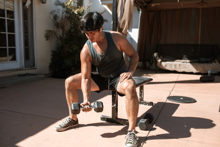 Man Using A Dumbbell