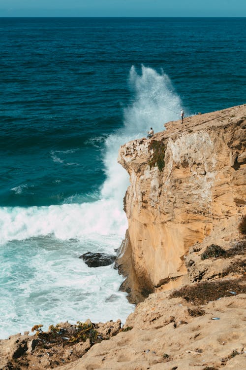 Waves Crashing on Rock Formations