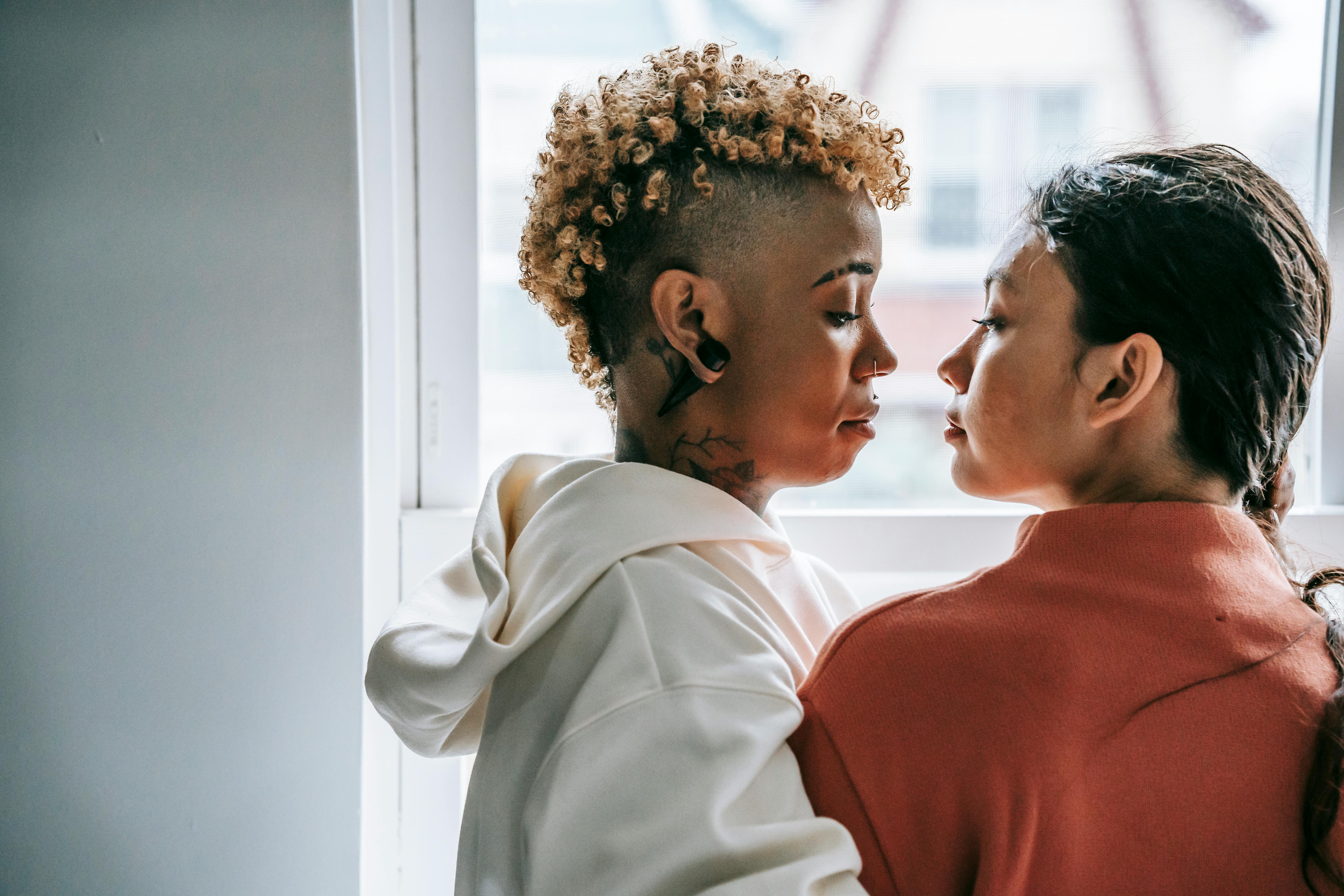 lesbian couple looking at each other