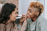 Loving lesbian couple admiring each other