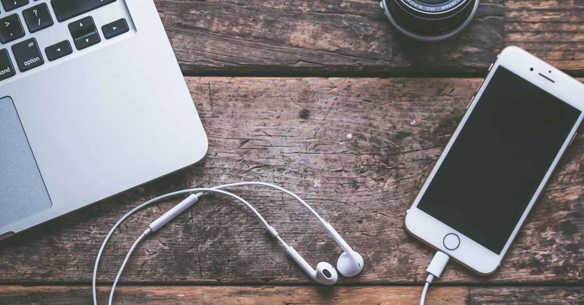 smartphone plugged in on a kitchen counter away from the bedroom