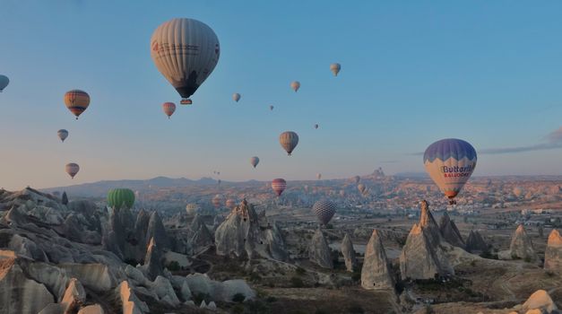 Hot Air Balloons in the Sky Over Natural Rock Formations