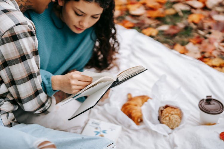 Loving Couple On Blanket During Picnic