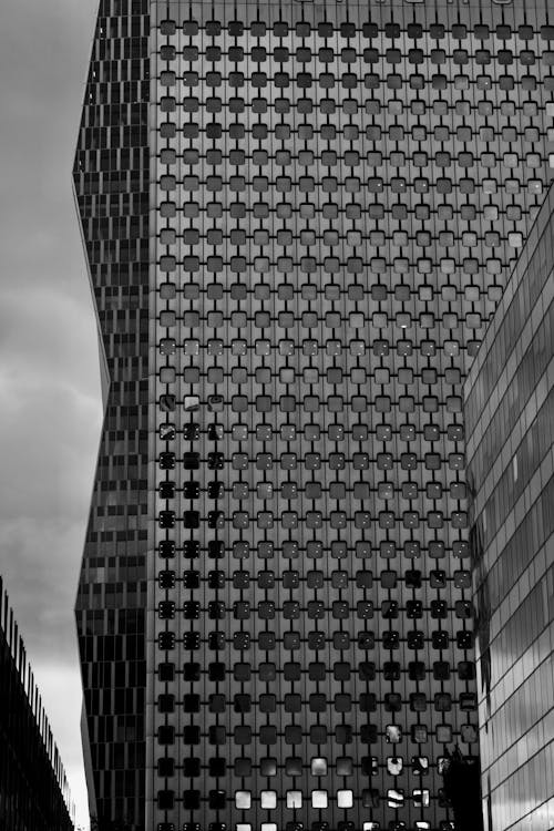 Grayscale Photo of High Rise Building