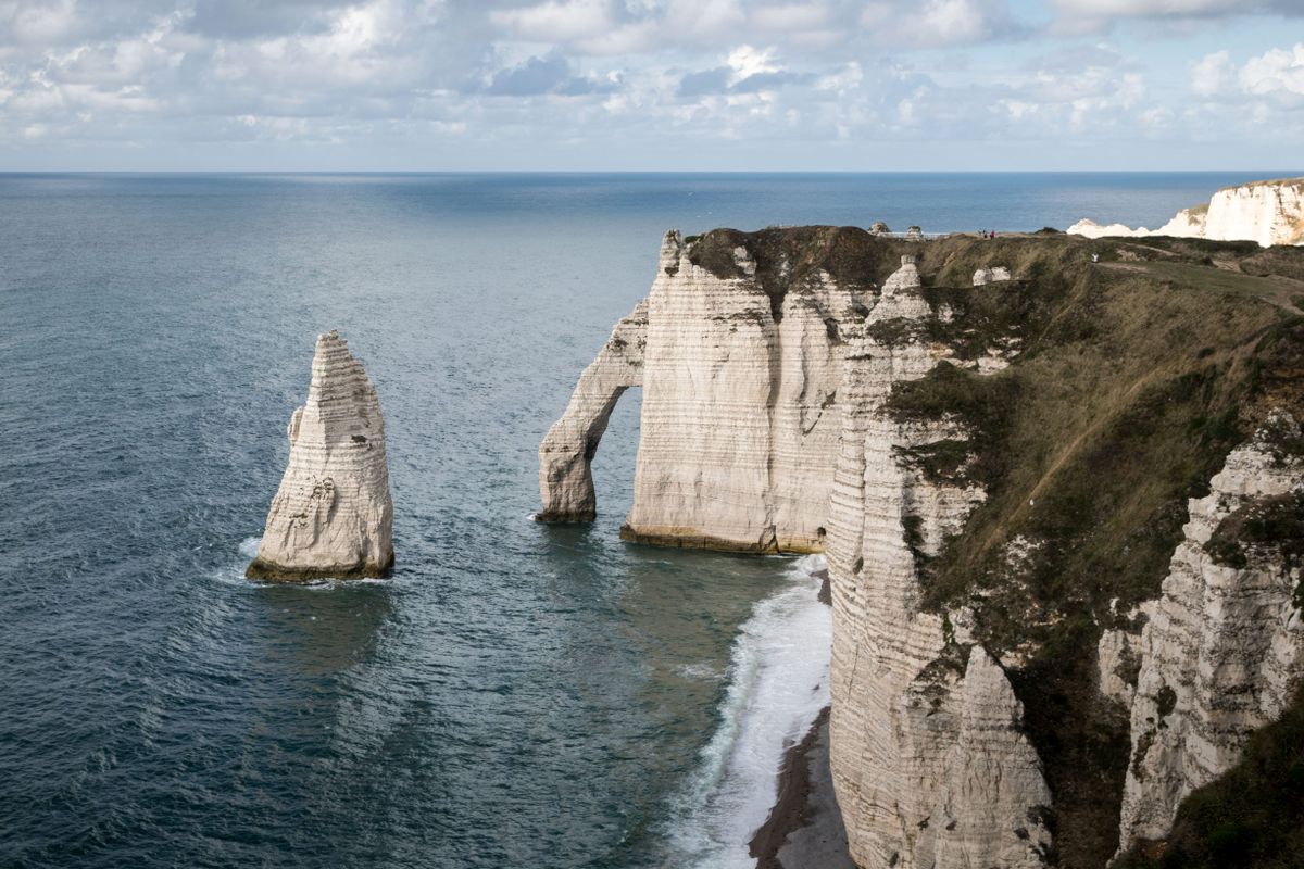 Anglers fishing along the rocky French coast