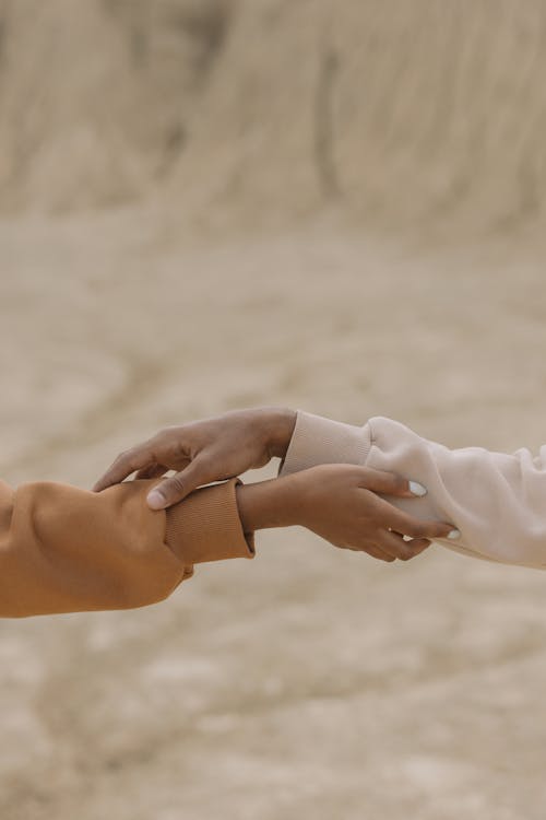 Free People Holding their Hands Stock Photo