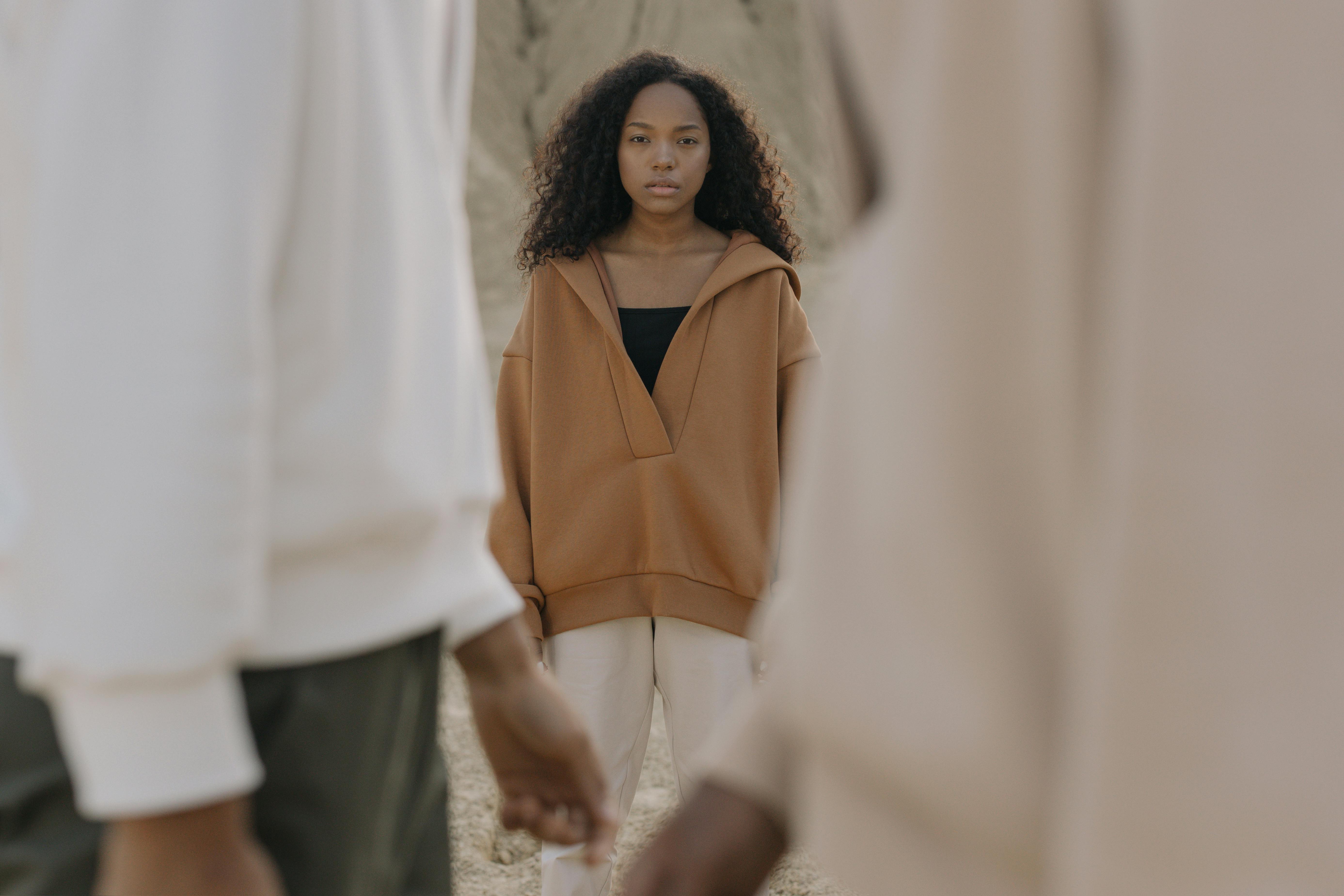 woman in brown hoodie