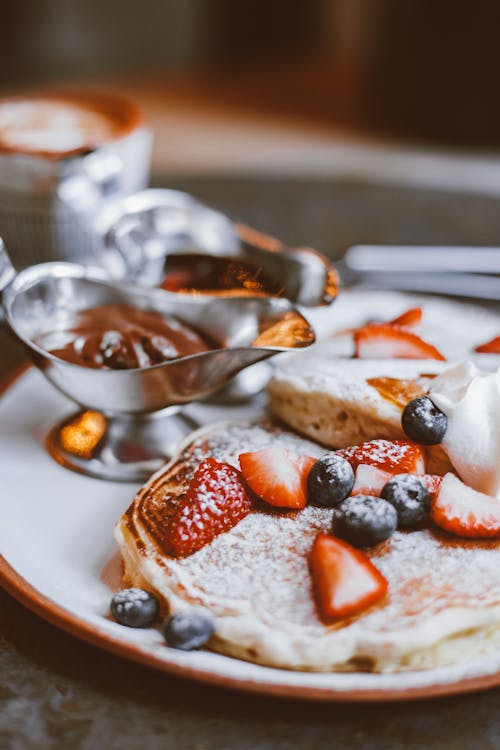 Pancakes with Fruit Toppings on a Plate