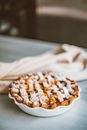Brown and White Pastry on White Ceramic Plate