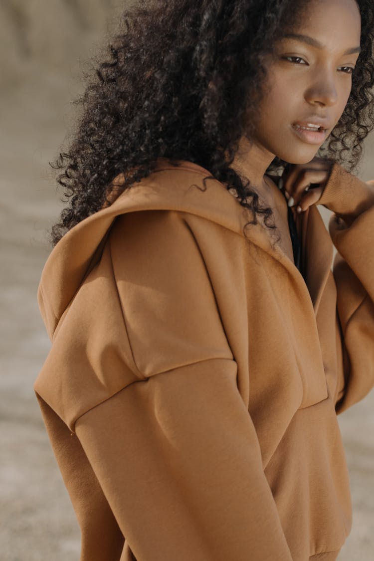 Woman In Brown Hoodie