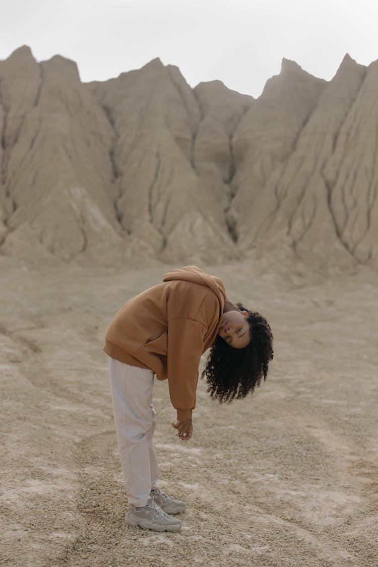 Woman In Brown Hoodie