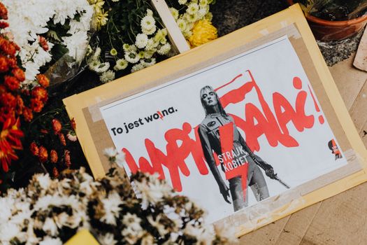 Pro Choice Poster Among Flowers During a Protest 
