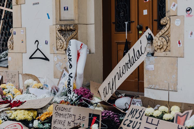 Banners And Flowers On A Womans Protest On Abortion Laws In Poland 