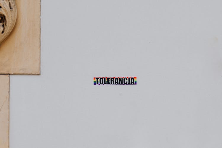 Tolerance Rainbow Sticker In Polish On Wall