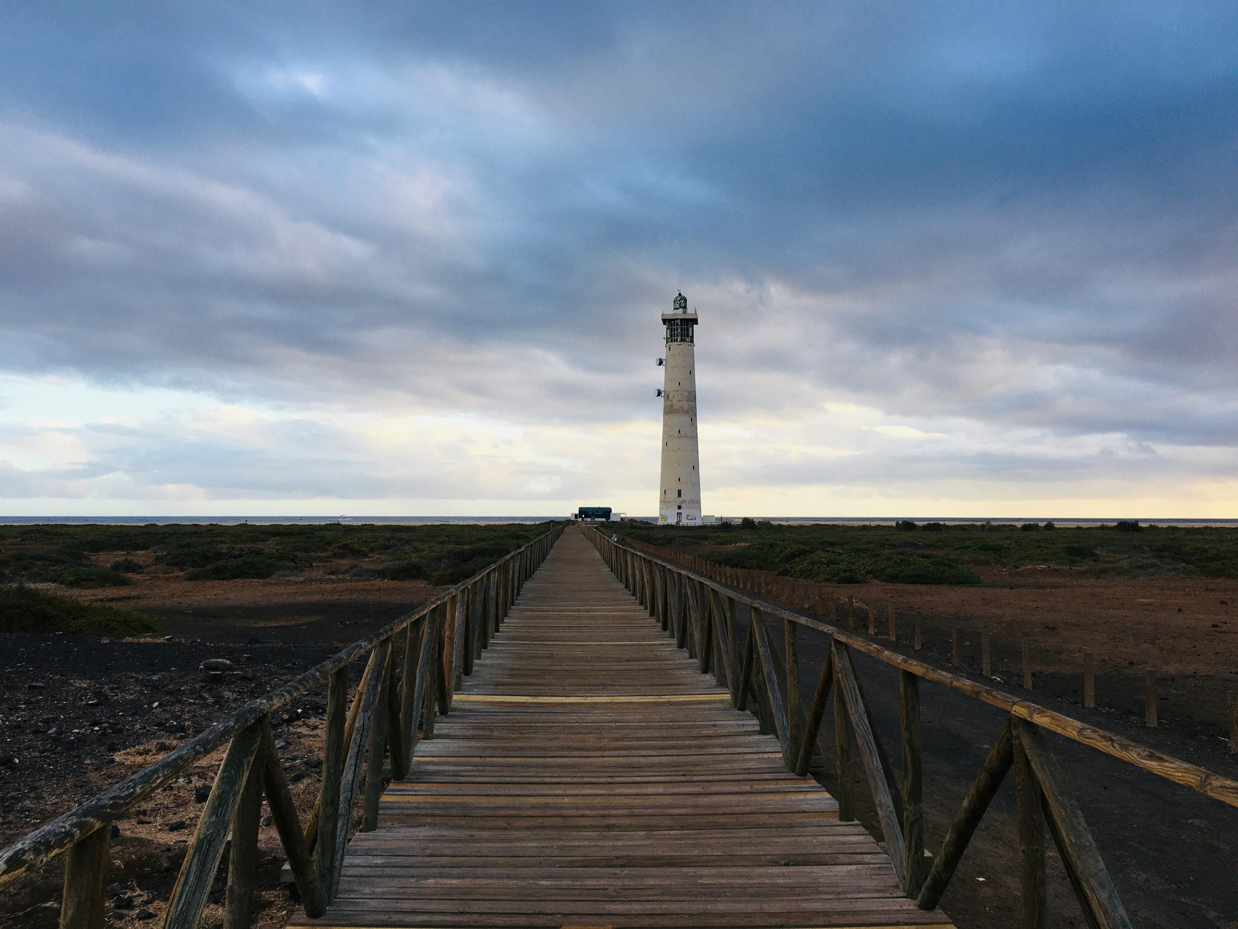 Wooden tiles spelling ETF growth on a wooden surface, symbolizing investment strategy