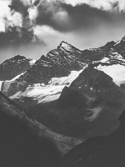 Grayscale Photo of Mountains 