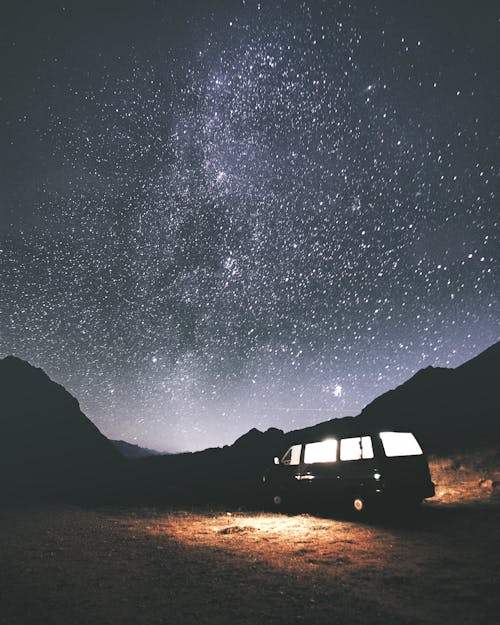 A Van Under the Starry Night Sky 