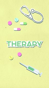 Top view of decorative cardboard illustration with Therapy inscription among syringe with stethoscope and assorted medicines on light background