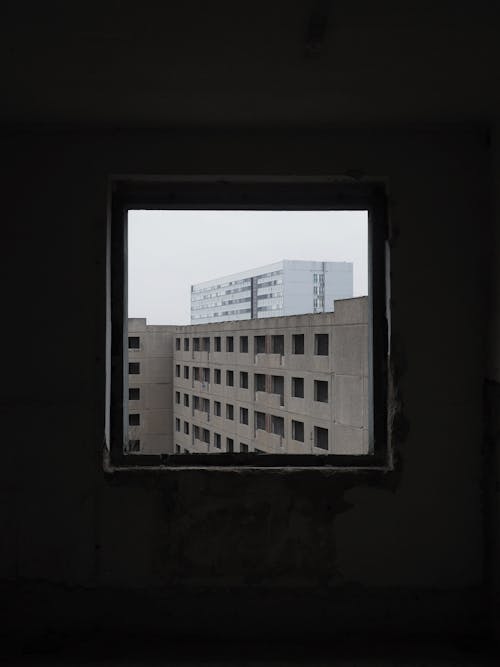 A View of the Buildings Through a Window