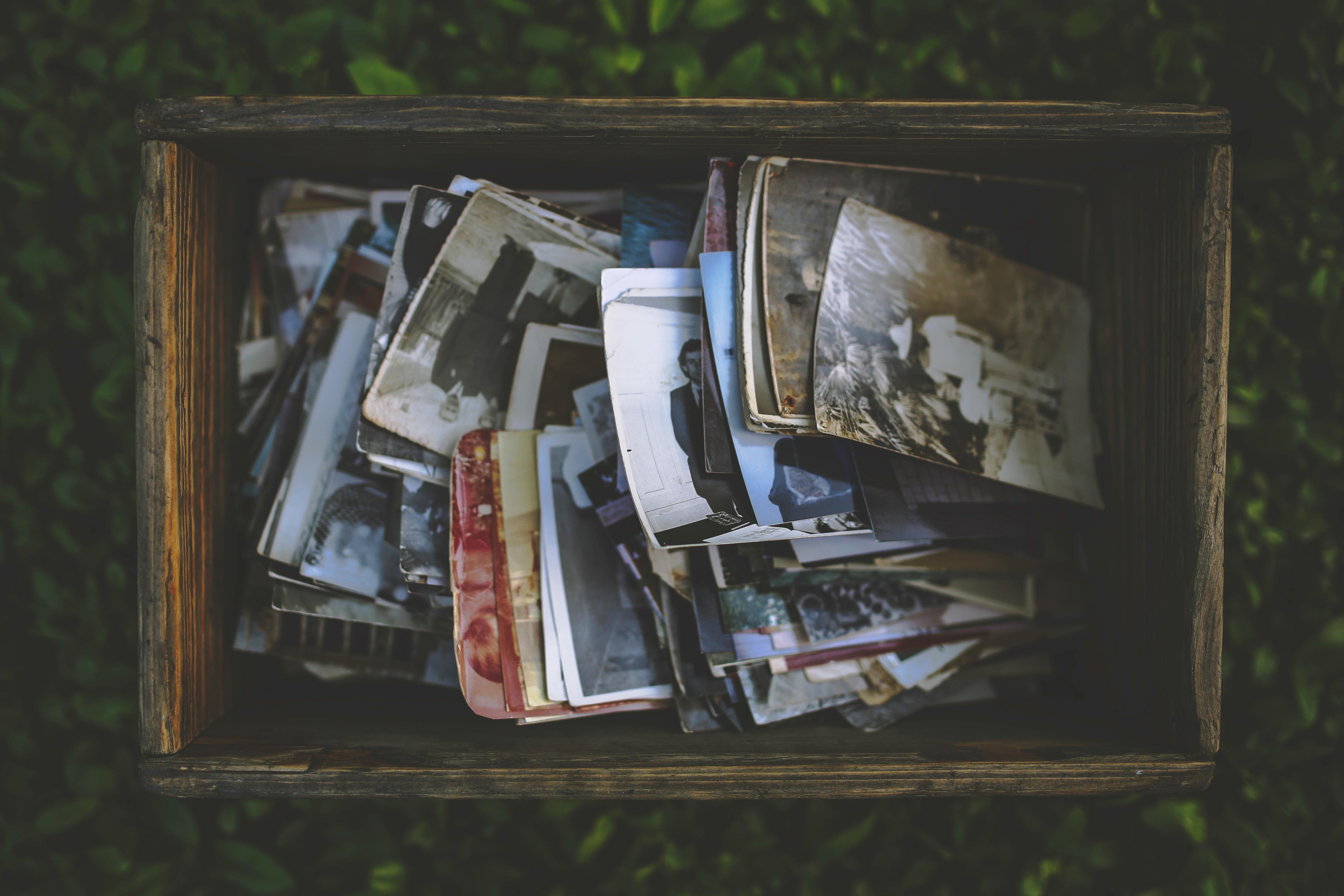 Old photos in the wooden box · Free Stock Photo