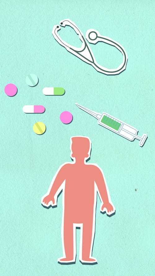 Decorative cardboard appliques of sick human figure under pills and capsules near syringe and stethoscope on green background