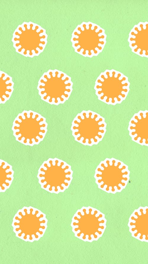 Free Top view of textured backdrop representing cutout paper appliques of orange viruses in rows Stock Photo