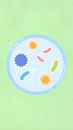 Cutout paper composition of cell with bacteria and viruses