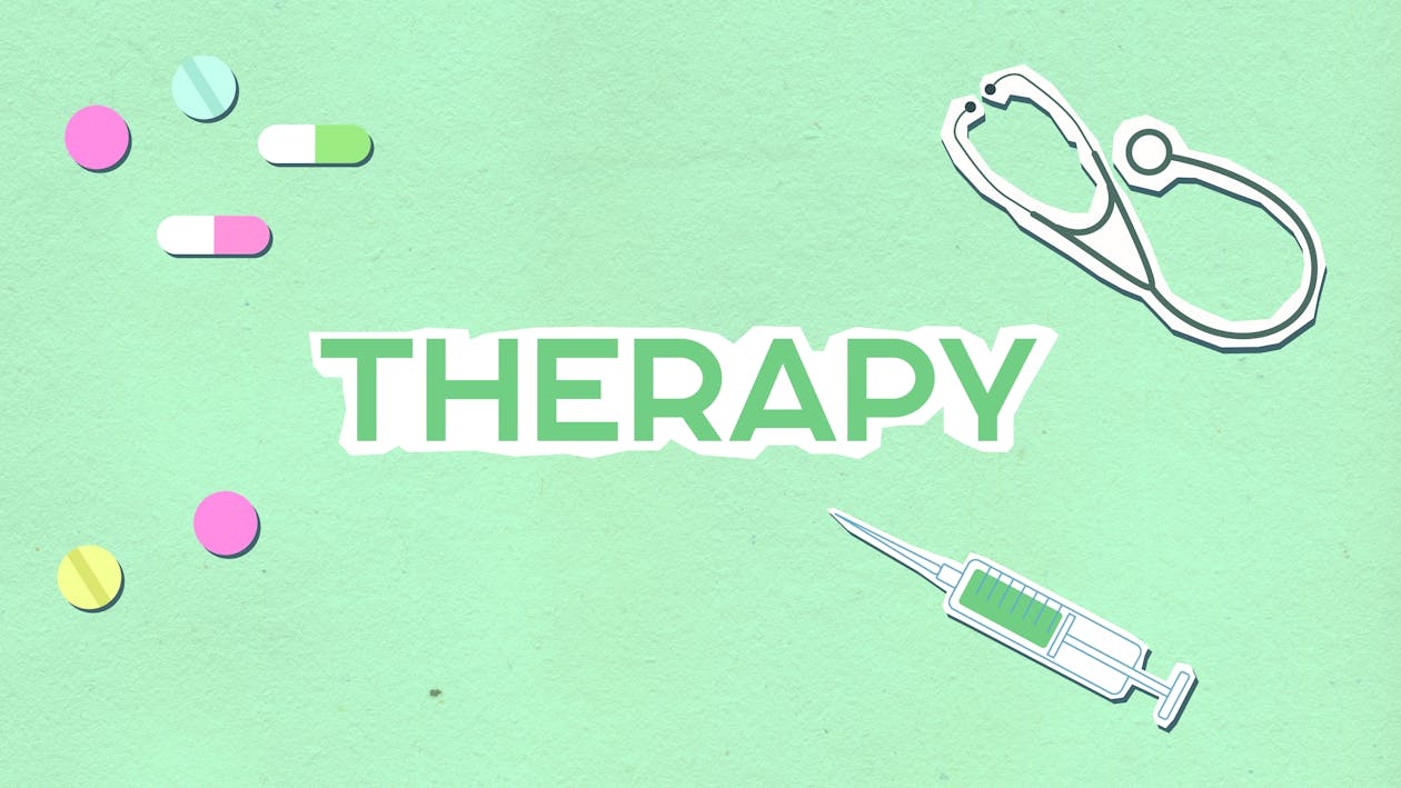 Free Overhead view of decorative cardboard appliques representing inscription among medical instruments and various pills with capsules on green background Stock Photo