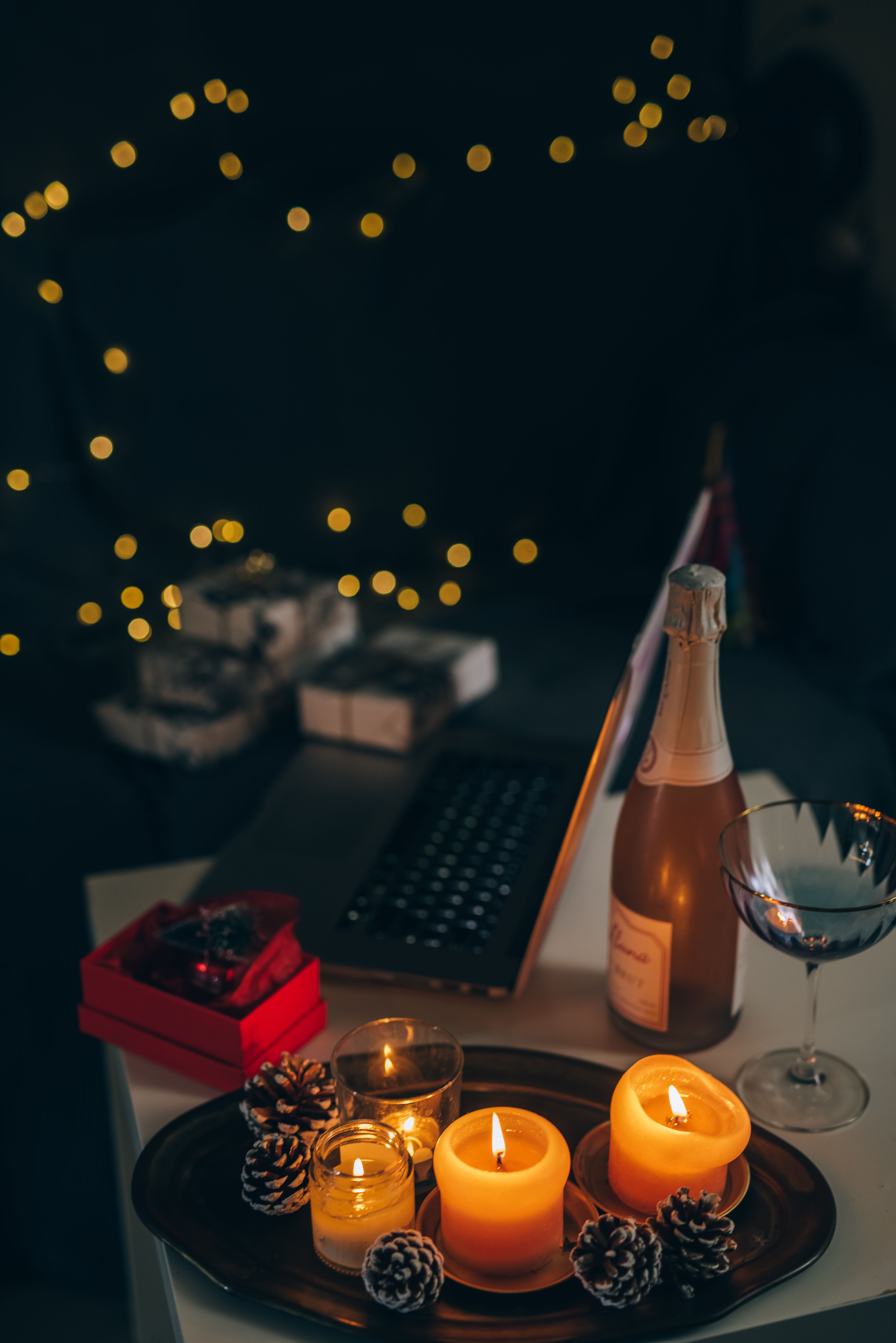 Pine Cones and Burning Candles on a Tray · Free Stock Photo