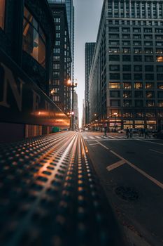 Urban street view capturing the towering skyscrapers in downtown Chicago during daytime.