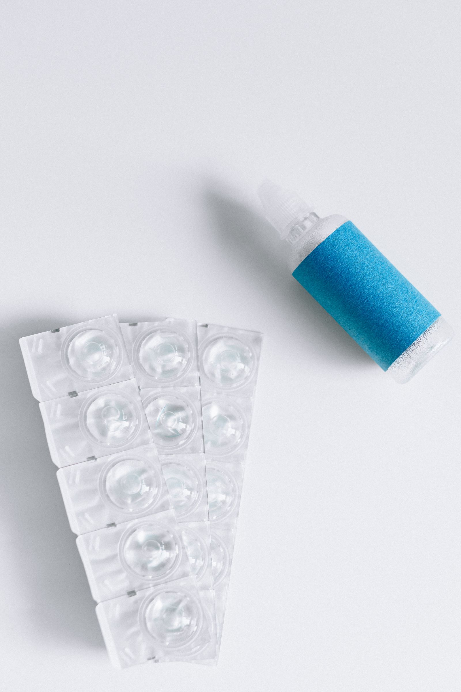 Daily disposable contact lens blister packs arranged on a counter