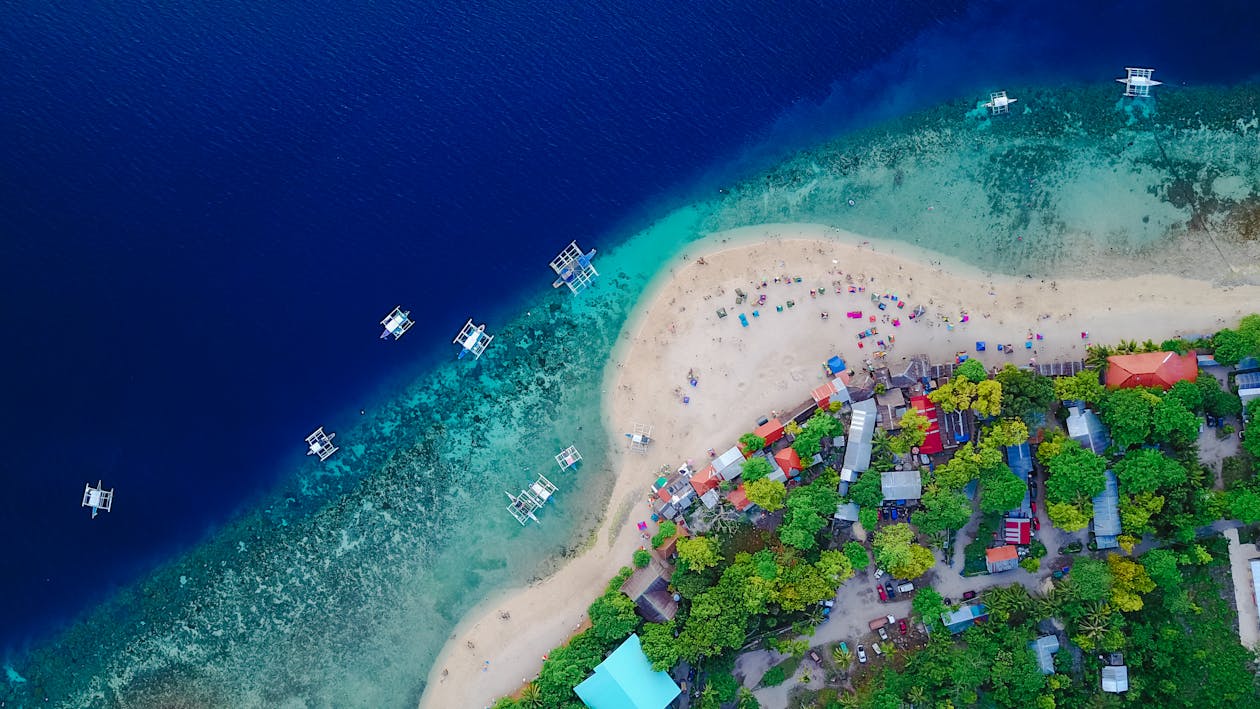 Free Aerial View of a Shore and Body of Water Stock Photo