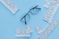 Black Framed Eyeglasses on White Table